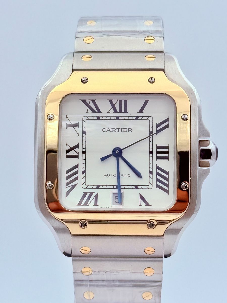 Orologio Santos de Cartier, modello grande, movimento automatico, oro giallo, acciaio, bracciali intercambiabili in metallo e pelle