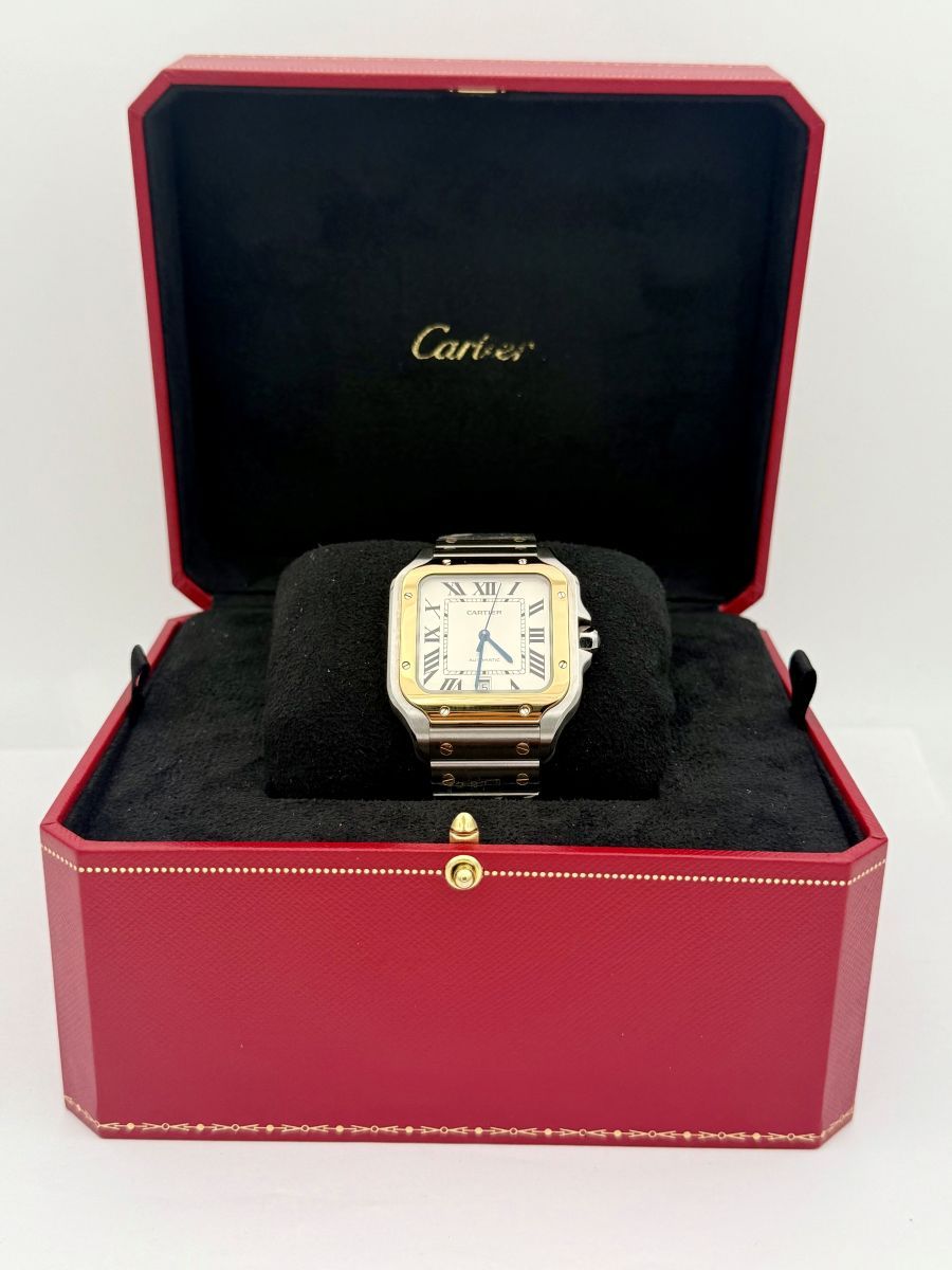 Orologio Santos de Cartier, modello grande, movimento automatico, oro giallo, acciaio, bracciali intercambiabili in metallo e pelle