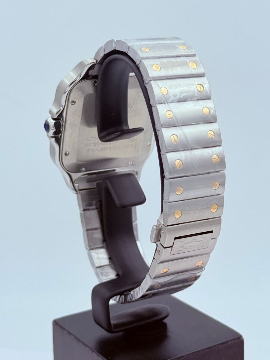 Orologio Santos de Cartier, modello grande, movimento automatico, oro giallo, acciaio, bracciali intercambiabili in metallo e pelle
